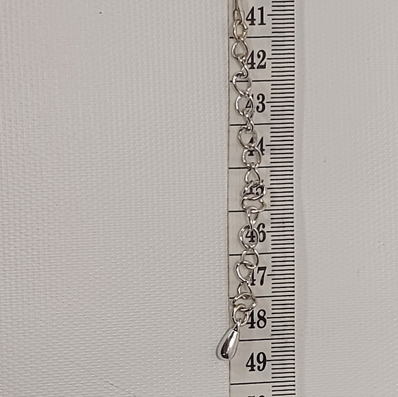 Kenneth Cole Vintage Silver Tone Teardrop Pendant Necklace - Picture 9 of 9